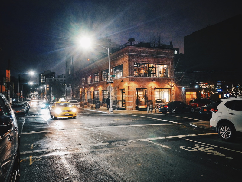 road, car, new york city, street, city street, sign, incidental people, busy, symbol, united states, architecture, built structure, mode of transportation