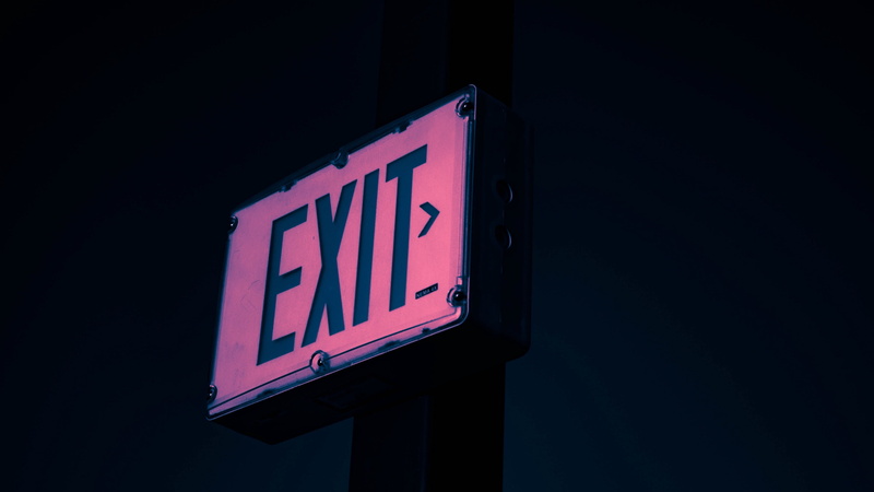 red, text, indoors, dark, information, low angle view, illuminated, neon, signage, exit, no people, night, exit sign, capital letter, time, domestic room