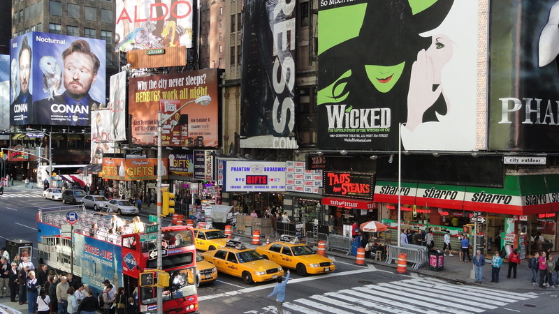billboard, city, mode of transportation, travel destinations, built structure, street, motor vehicle, city life, manhattan, car, building exterior, real people