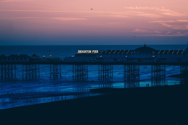 nature, pier, summer, sunlight, brighton, beauty in nature, scenics, coastline, night, cloud - sky, outdoors, architecture, sea, water, built Structure