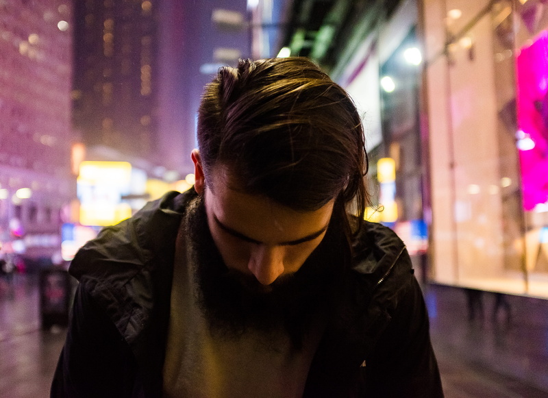 building exterior, city lights, adult, outdoors, times square, illuminated, clothing, night, real people, city life, architecture, theater district, leisure activity