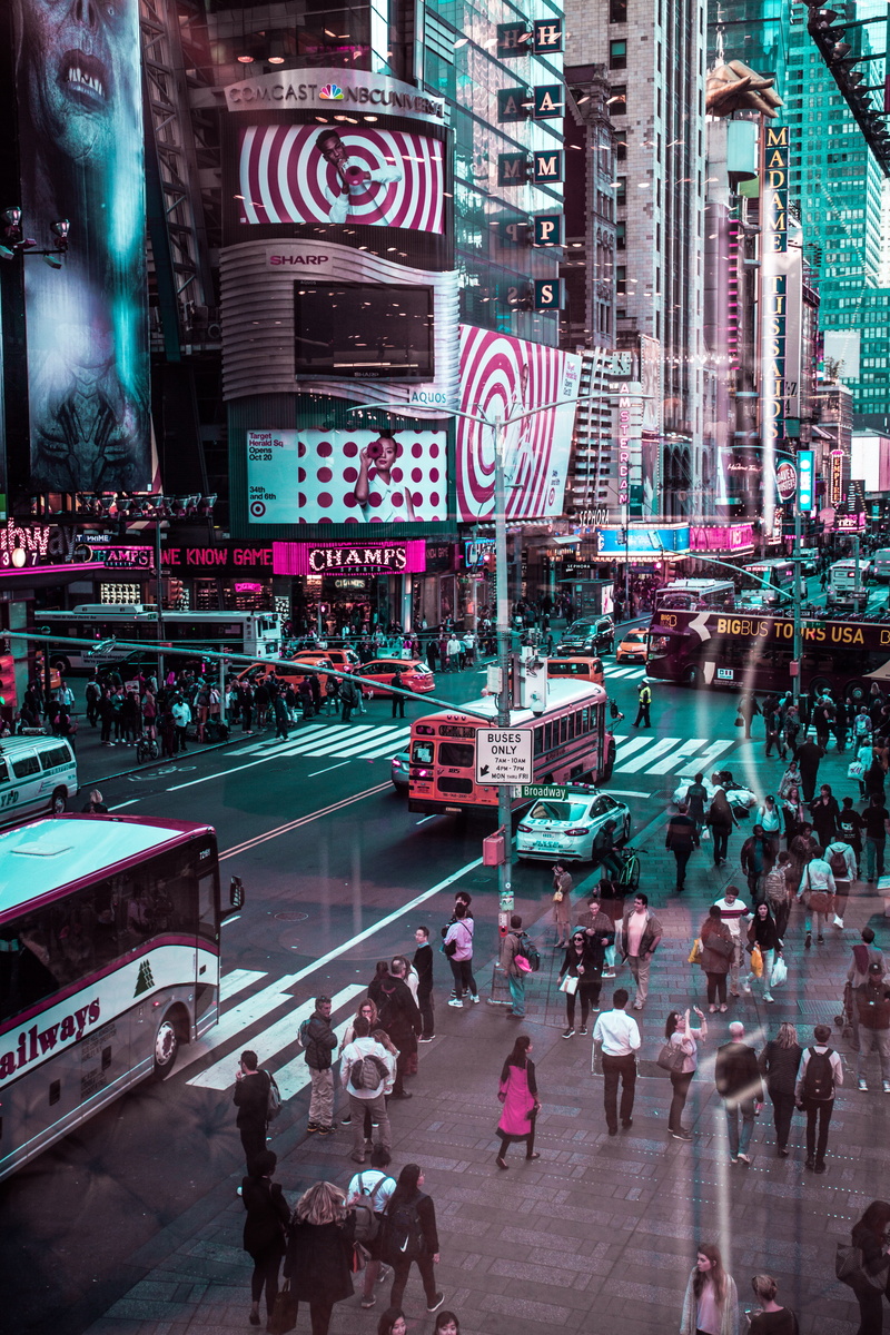 text, lifestyles, blue, nyc, united states, group of people, time square, architecture, city life, real people, women, street, crowd, new york, city street