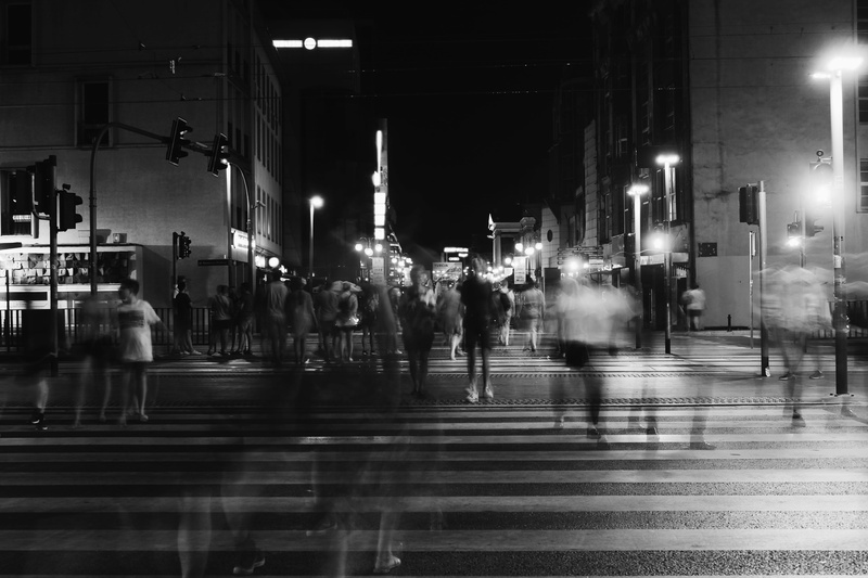 group of people, night, outdoors, road, built structure, women, pavement, buildings, city, building exterior, night time, time lapse, transportation, architecture