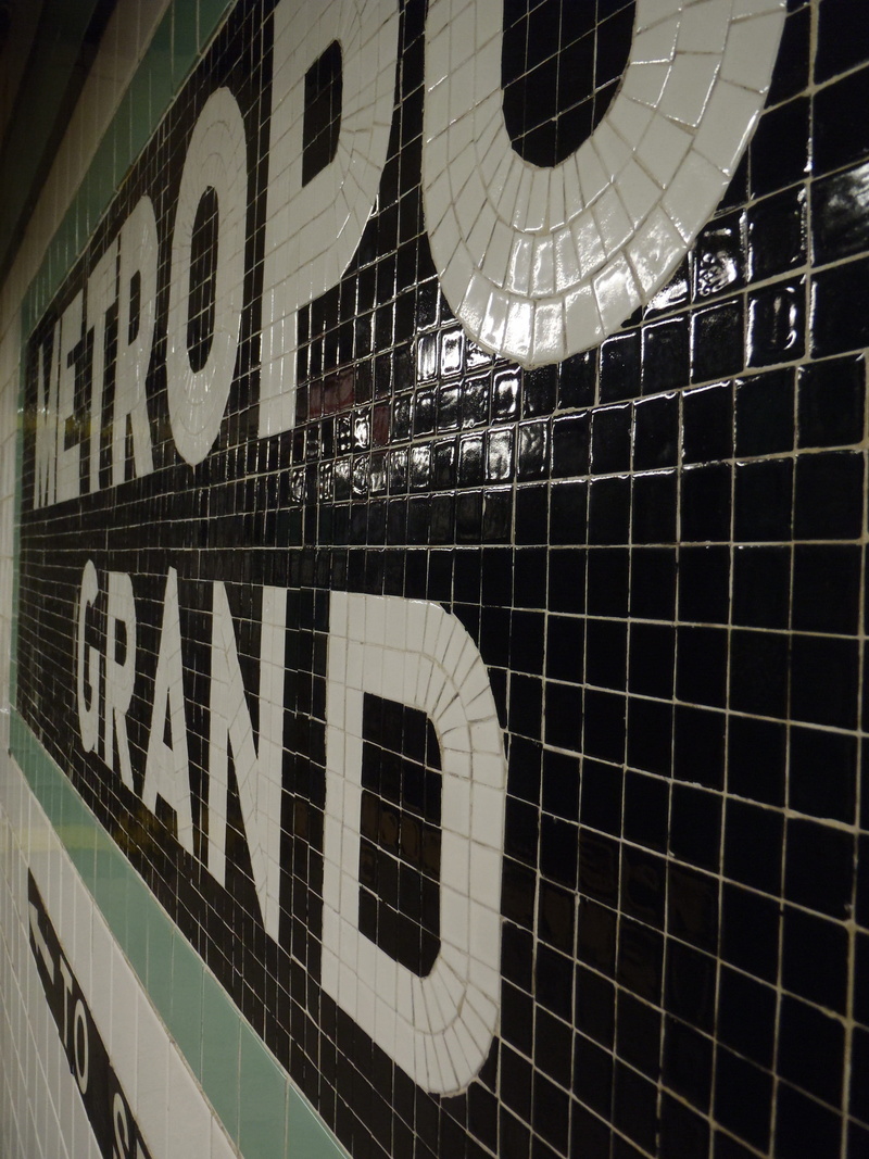 indoors, text, Metro, new, wall - building feature, western script, illuminated, night, city, outdoors, built structure, flooring, capital letter, tile