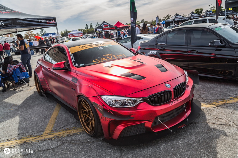 2K, red, motor vehicle, built structure, transportation, BMW M4 Coupe, city life, city, street, architecture, travel, car, real people, road, outdoors
