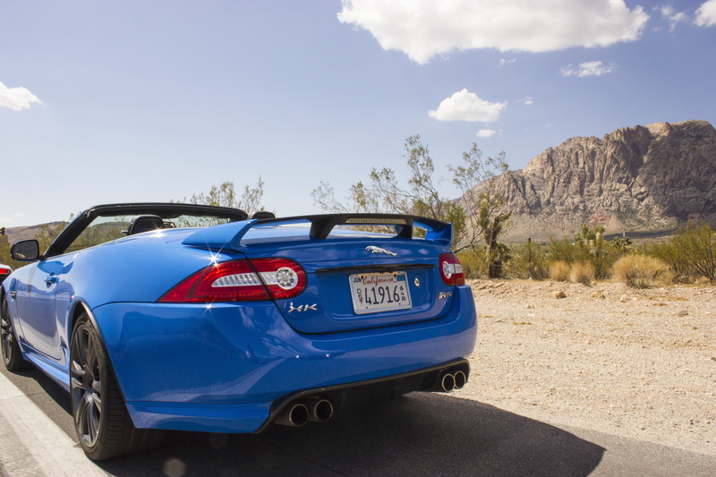 road, vehicle, outdoors, mode of transportation, door, day, blue, blue cars, no people, 5K, rock, desert, motor vehicle, sunlight, land vehicle, transportation