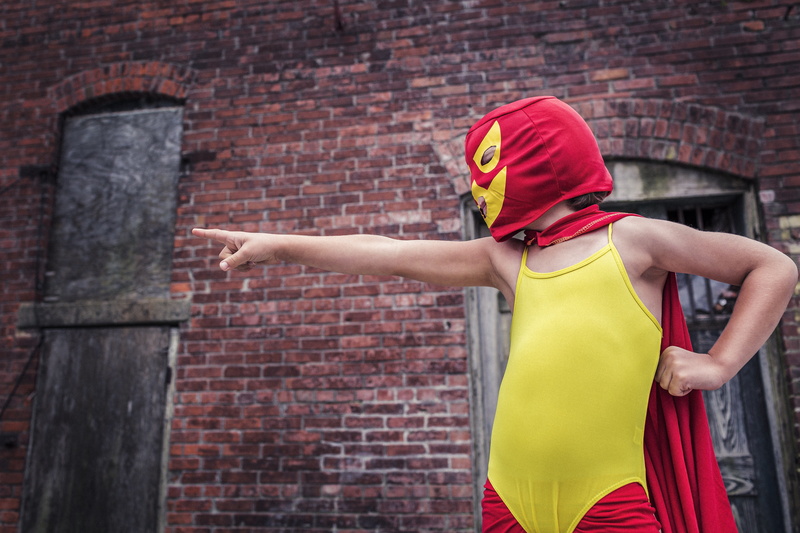 architecture, arms raised, outdoors, day, safety, standing, mexican, yellow, people, adult, brick, crime, lazy, whimsical, action, human arm, human body part