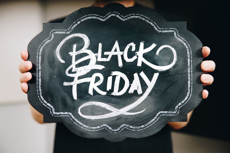 Sale, human body part, indoors, black, board, photo, sign, text, message, one person, friday, drawing - art product, black color, men, art and craft, blackboard