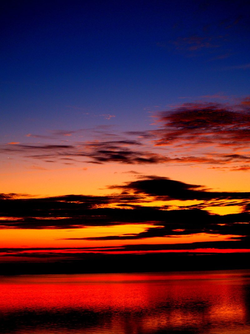 cloud - sky, dramatic sky, blurred motion, horizon, weather, yellow, dramatic, view, skies, black, crisp, orange color, sunset, evening, nature, hour, reflection