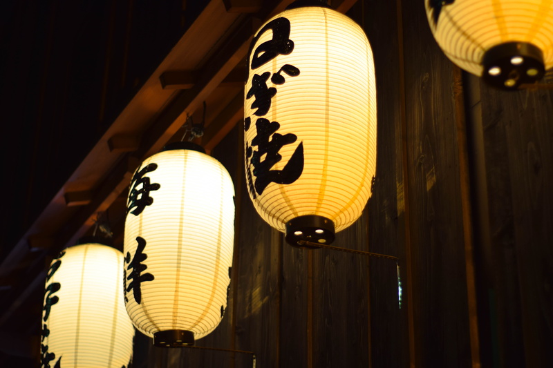 text, roppongi hills, low angle view, night, electric lamp, 5K, paper lantern, chinese new year, celebration, lighting equipment, in a row, no people