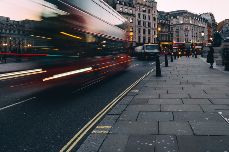 city street, 4K, mode of transportation, daytime, building, pavements, architecture, time, traffic, vehicle, railroad track, buildings, bus, public transportation