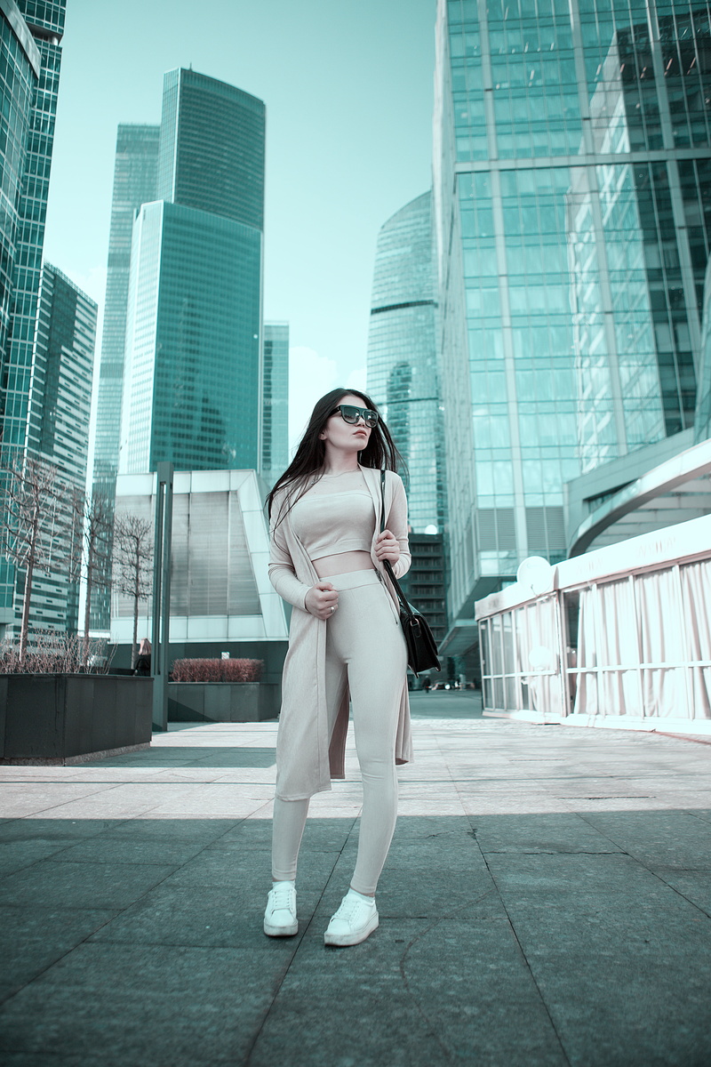 financial district, adults only, full length, high, skyscraper, 5K, view, glasses, fashion, city, real people, photo, outdoors, only women, girl, leisure activity