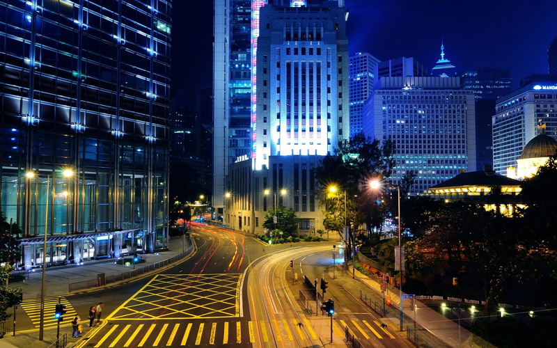 famous Place, built Structure, dark, illuminated, sign, speed, financial District, blue, office Building, architecture, road marking, city street, blurred Motion