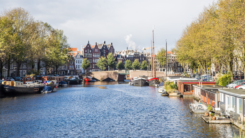 city centre, bridge - man made structure, water, sky, passenger craft, near, channel, megalopolis, tourism, the urban landscape, cityscape, mode of transportation