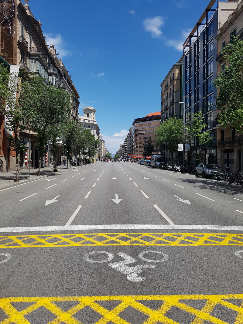 street, dividing line, sky, outdoors, pavement, road, strip, direct, transportation, asphalt, day, horizontal, marking, the transportation system, building exterior