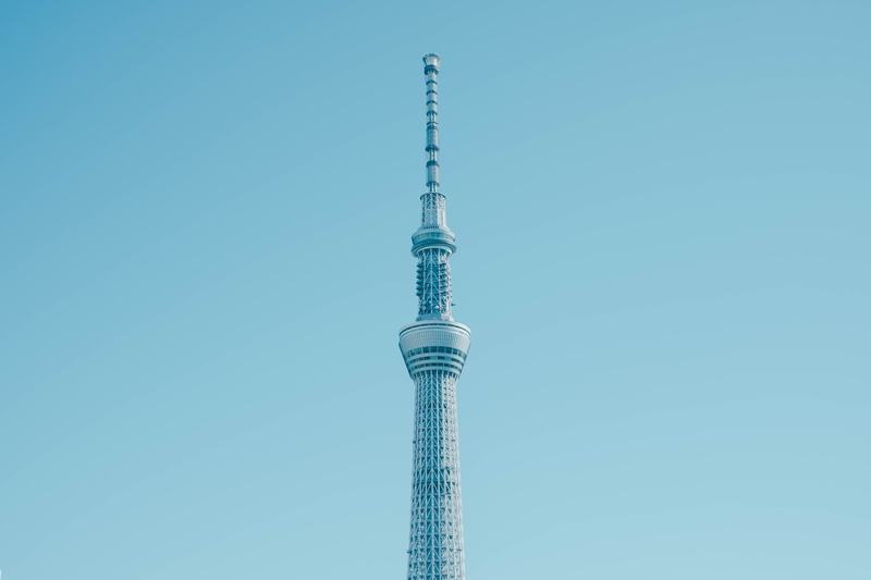 control tower, office building exterior, clear sky, development, skyscraper, metropolis, outdoors, high rise, metal, urban, industry, building, nature