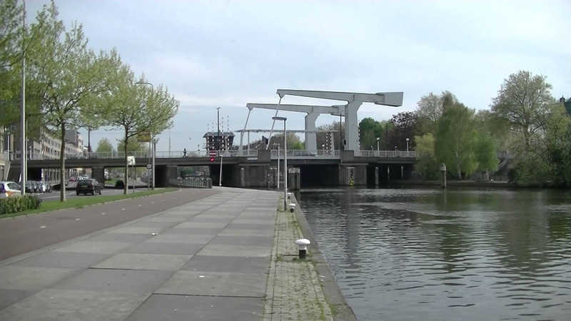 building exterior, day, connection, most beautiful bridge of rotterdam, mode of transportation, rail transportation, 1080P, architecture, outdoors, aalbrechtskade