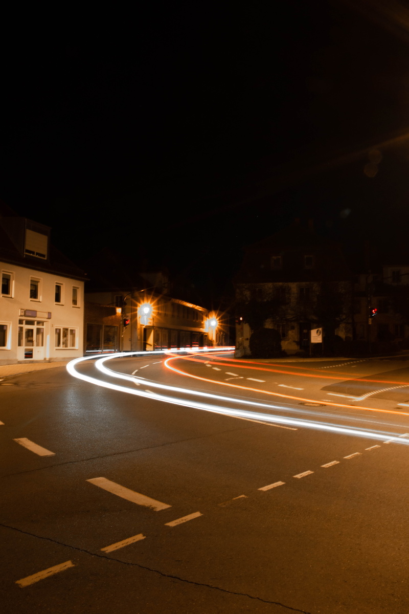 road marking, time, illuminated, licht, sign, street light, trail, blurred motion, building exterior, intersection, scheinfeld, no people, city, belichtung