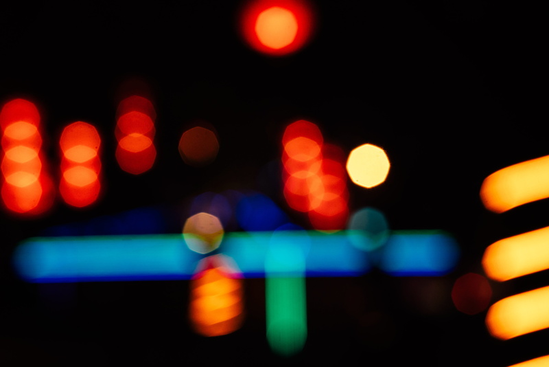 vehicle light, glowing, multi colored, urban, street, illuminated, city, light - natural phenomenon, neon, no people, background, black background, architecture