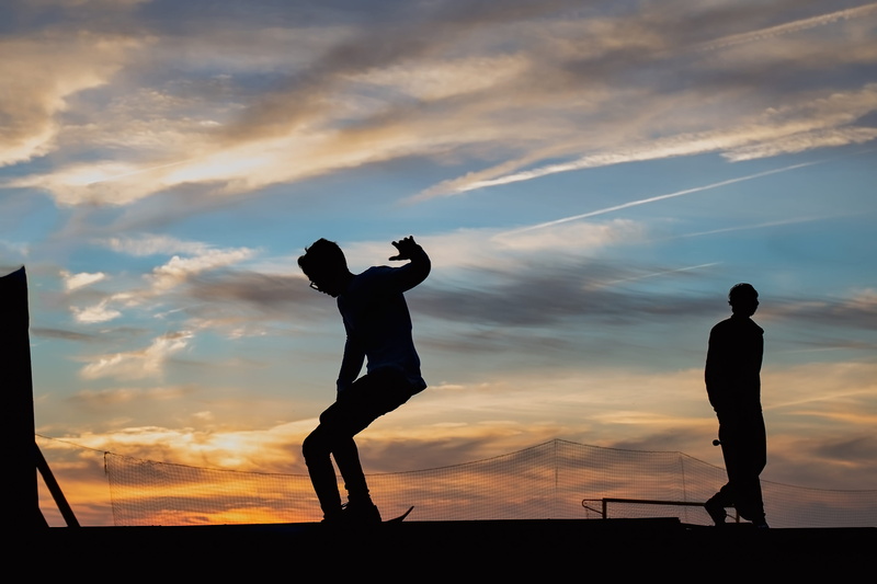 skater, real people, bonding, skateboard, skatepark, youth, jump, sunset, active, half-pipe, leisure activity, extreme, nature, pipe, standing, two people