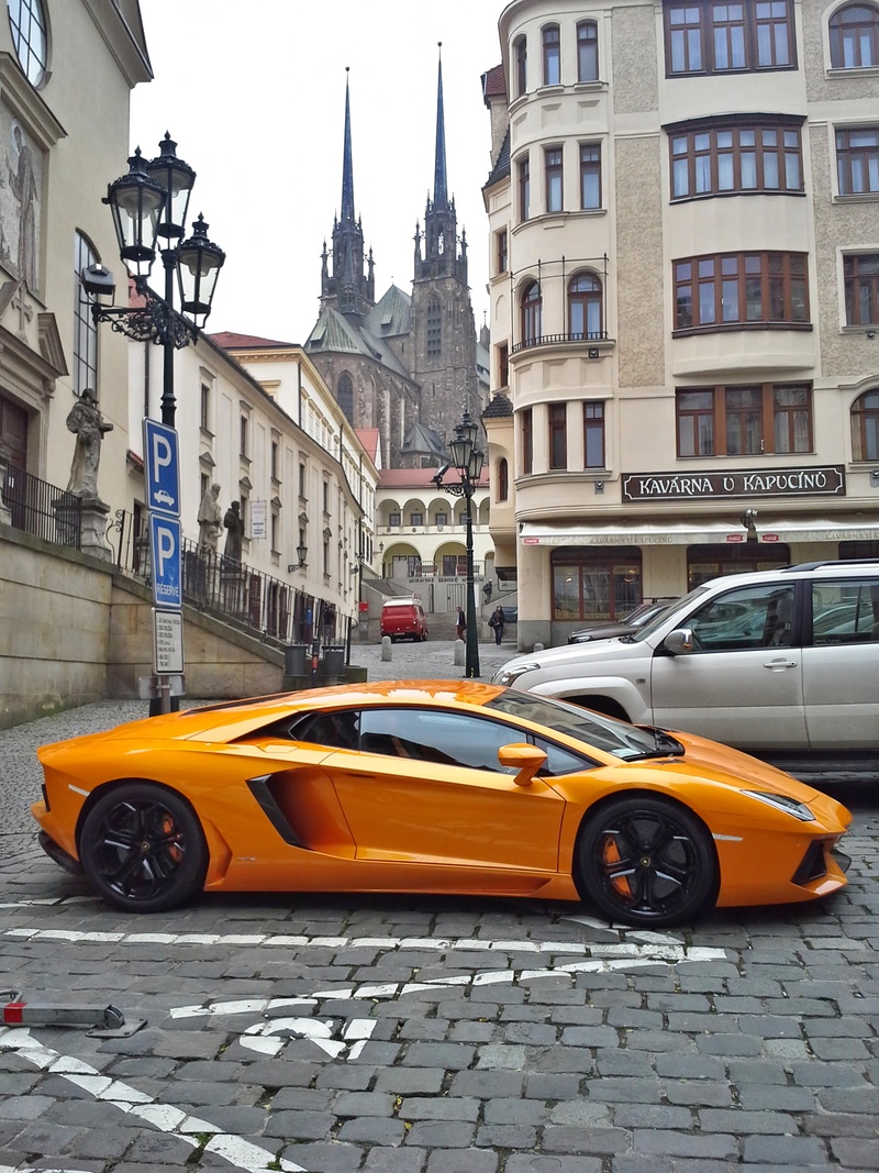 lamborghini, mode of transportation, sports, motion, residential district, city, automobiles, building exterior, orange, power, building, street, transportation