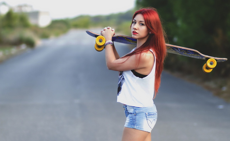 skateboard, one person, women, portrait, hair, beauty, long hair, lifestyles, standing, looking at camera, casual clothing, outdoors, holding, hairstyle