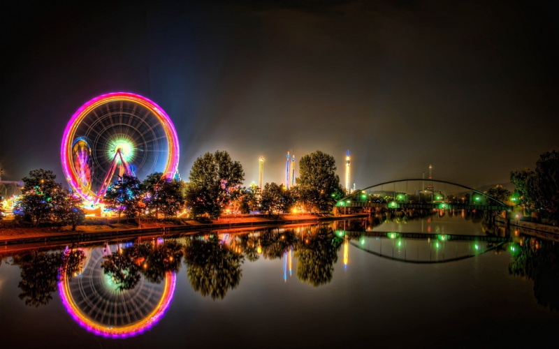 travel, cityscape, park, built Structure, amusement park, wheel, nightlife, motion, night, illuminated, lighting Equipment, waterfront, urban Scene, river