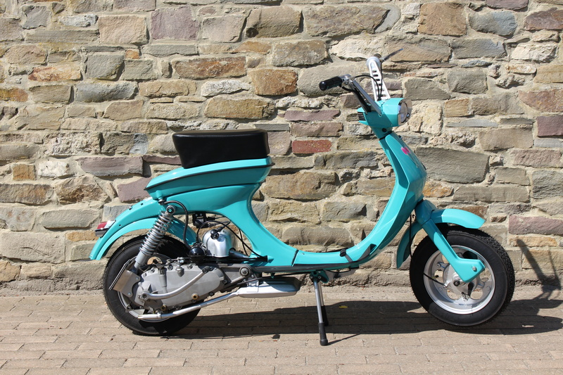 wall - building feature, 5K, street, wall, brick, brick wall, no people, motor scooter, stone wall, transportation, built structure, outdoors, lambretta him