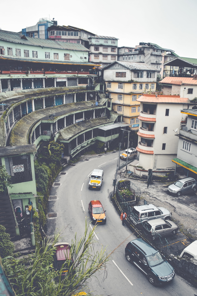 buildings, sikkim, transportation, outdoors, residential district, traffic, car, city, citylife, turn, built structure, city life, nature, india, high angle view