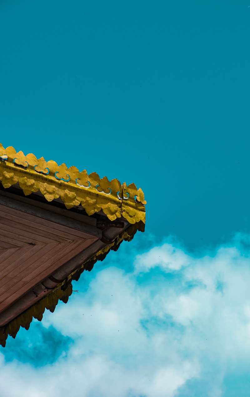 built structure, directly below, high section, sky, pattern, building, nature, india, sikkim, yellow, day, copy space, cloud - sky, building exterior, blue