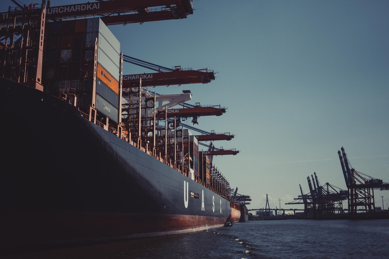 building exterior, vessel, logistics, transportation, docks, machinery, cargo, cargo container, industry, shipping, watercraft, harbour, outdoors, harbor