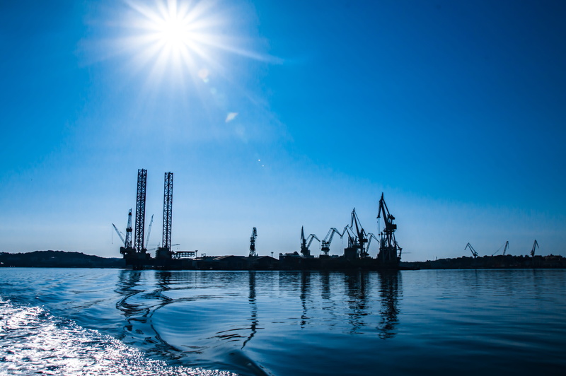 shipyard, sunbeam, architecture, sun, industry, croatia, sky, building exterior, on lake, sea, nature, reflection, lens flare, no people, waterfront, skyscraper
