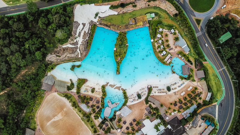 drone shot, architecture, outdoors, nature, aerial, low section, aerial view, personal perspective, 4K, birds eye view, photography, real people, plant