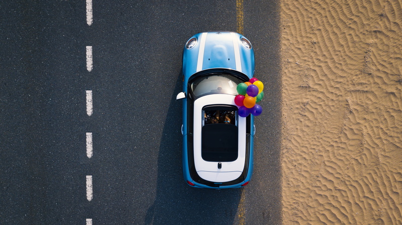 sunlight, telephone, aerial, driving, Mini Cooper, recreation, shadow, asphalt, drone cam, communication, top view, drone footage, drone shot, drone, wall - building feature