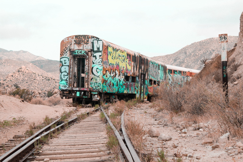 nature, abandoned, ruined, no people, mountain, lost, daytime, sky, arid climate, track, railroad track, art, multicolored, graffiti, deterioration, scenics - nature