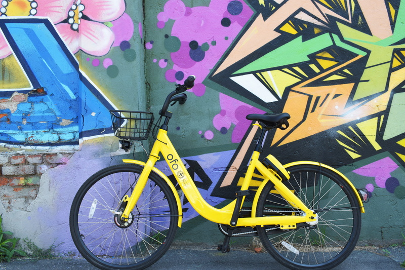 mode of transportation, stationary, transport, travel, creativity, wall - building feature, land vehicle, vehicle, parked, mural, brick, multi colored