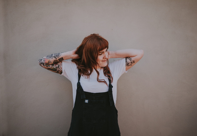 5K, lady, tattoo, white, overalls, brown, hairstyle, wall - building feature, caucasian, lifestyles, young adult, blank space, long hair, haired, dungaree