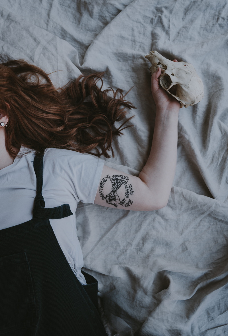 sheet, hairstyle, furniture, home interior, female, caucasain, 8K, woman, high angle view, linen, indoors, relaxation, one person, adult, covers, dungaree
