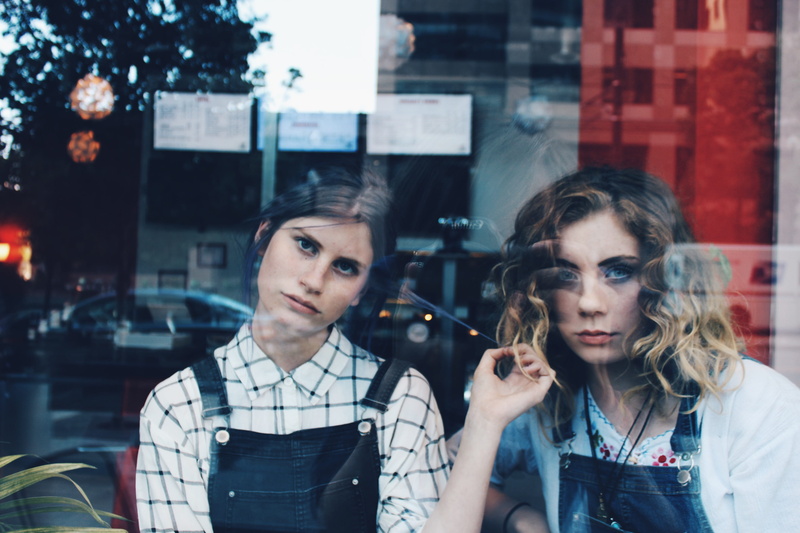 looking, two people, young adult, denim, brunette, contemplation, standing, lifestyles, female, beautiful woman, young men, friend, window, couple - relationship