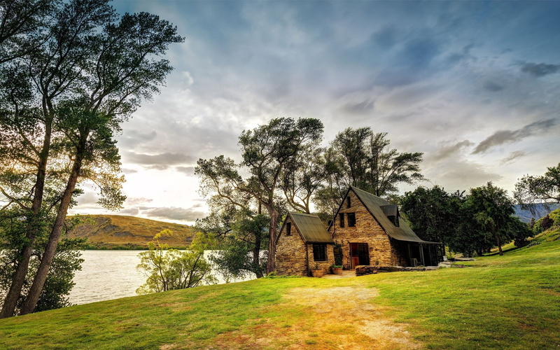 lake, building exterior, beauty in nature, outdoors, cottage, tree, building, sky, grass, architecture, house, river, no people, land, cloud - sky, HDR