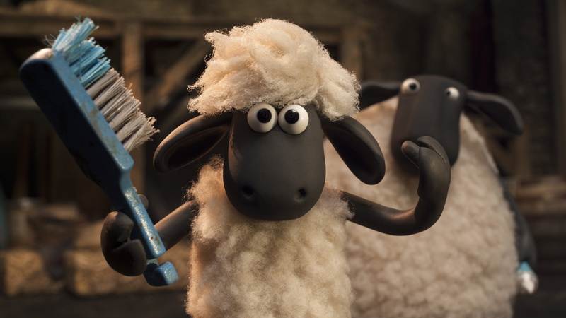 toy, day, animal representation, close-up, shaun the sheep movie, creativity, no people, hanging, stuffed toy, architecture, indoors, focus on foreground