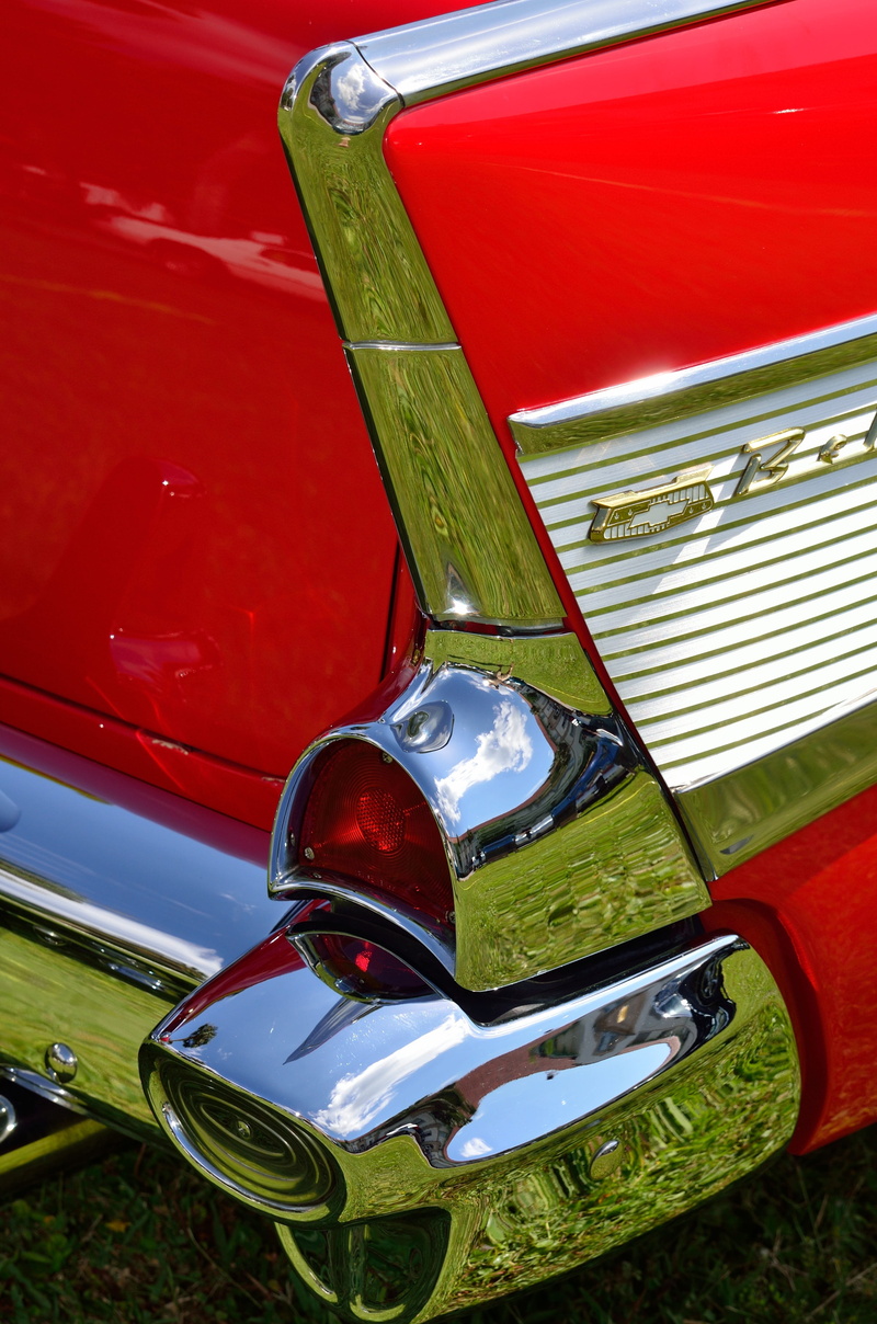 high angle view, car, antique, mode of transportation, metal, luxury, symbol, chrome, vintage car, motor vehicle, icon, red, close-up, transportation, design
