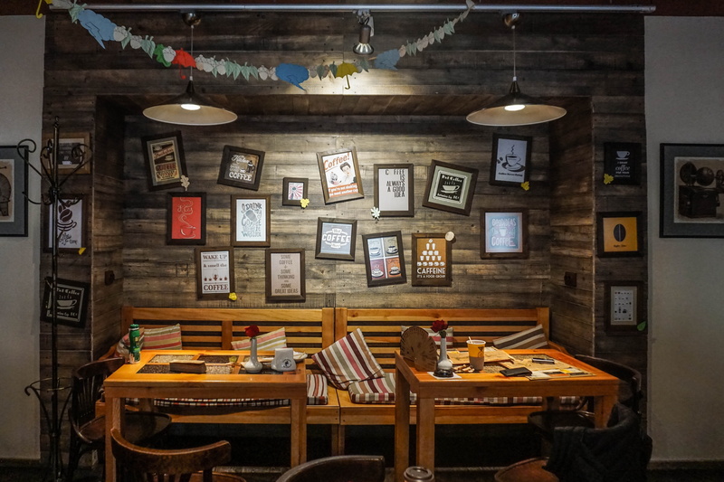lighting equipment, large group of objects, vases, shelf, furnitures, photo, decor, messy, wood, stock, wall, chair, near, food, painting, container, architecture