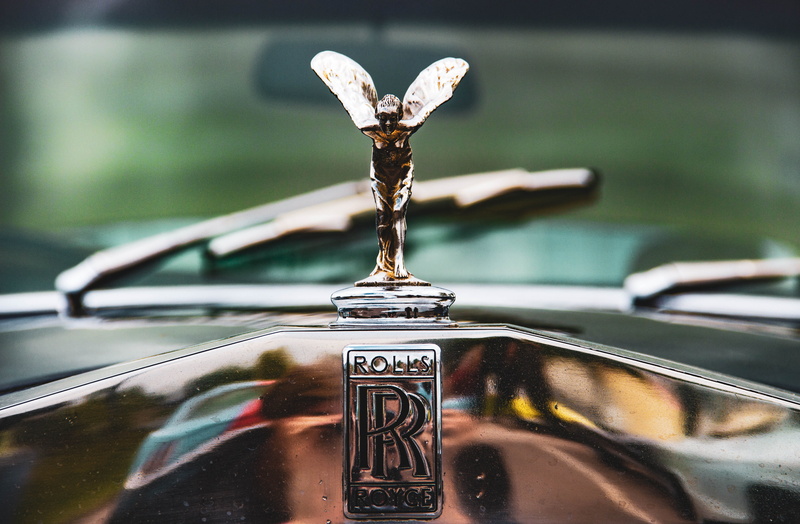meeting, logo, western script, retro styled, focus on foreground, automobile, outdoors, motor vehicle, symbol, sport, water, close-up, royce, nature, campus