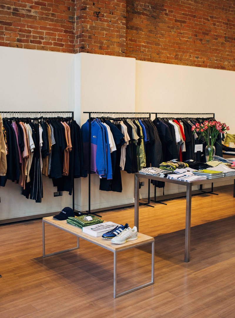 wall - building feature, jeans, rack, plywood, clothes rack, wall, closet, no people, interior design, blossom, assorted, plant, shop, apparel, wood, hanging