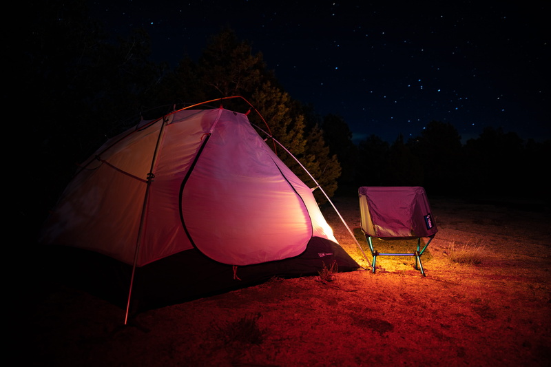 dark, sky, fire, land, adventure, chair, camping, purple, mountain tent, wheel, flooring, absence, furniture, tree, flame, illuminated, beauty in nature