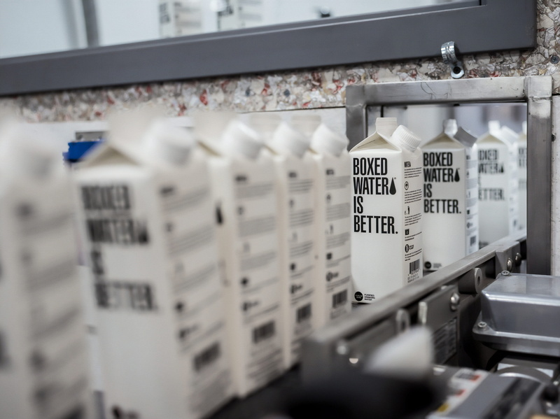 large group of objects, lab, machine, boxed, drink, text, factory, hanging, white, close-up, wheel, conveyor, 5K, connection, beverage, no people, in a row