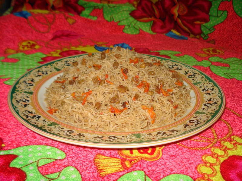 table, cooked, dish, meal, belief, art and craft, pilaf, pattern, indoors, creativity, no people, food, multi colored, close-up, design, plate, garnish