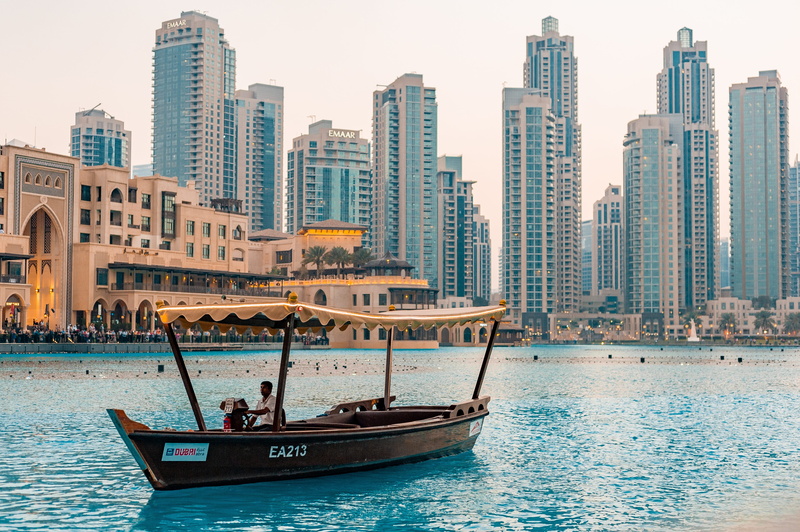 evening, nature, passenger craft, water, outdoors, building, built structure, sky, travel, gondola - traditional boat, building exterior, cityscape, uae