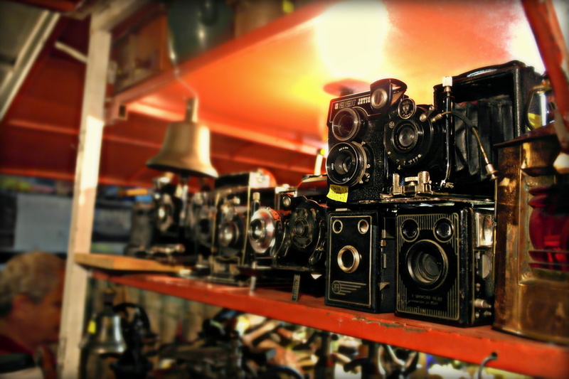 old, selective focus, locomotive, camera - photographic equipment, focus on foreground, connection, indoors, photography themes, nostalgia, close-up, no people